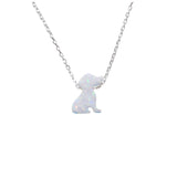 Tiny opal dog pendant necklace on a sterling silver chain displayed against a clean white background.